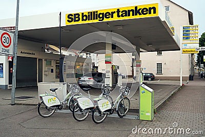 Gas Station and Bike sharing station in Offenburg, Germany Editorial Stock Photo